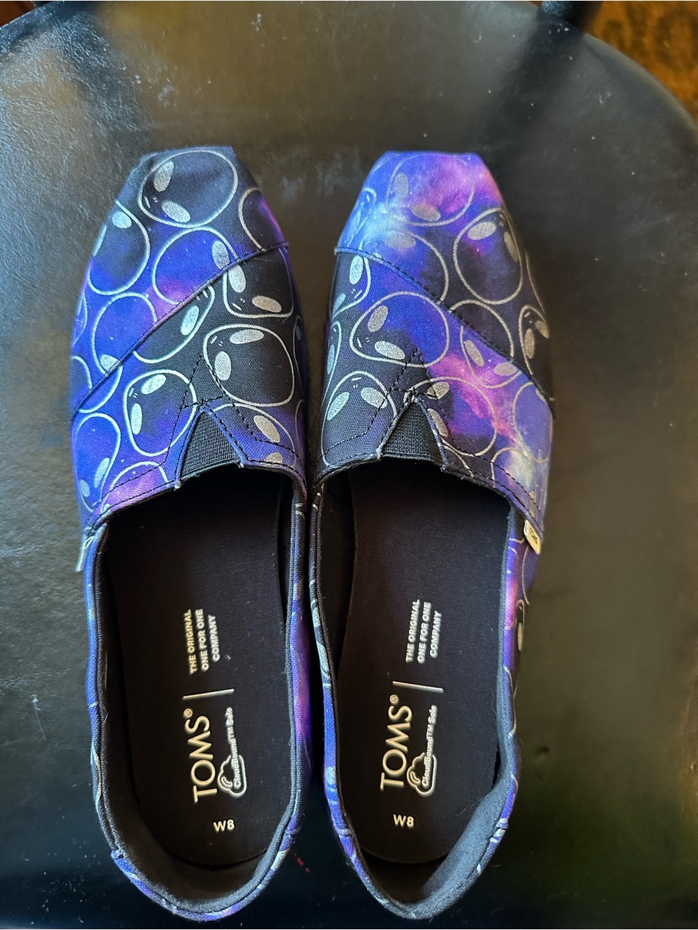 TOMS Women's Slip-On Moccasins in Purple and Black Galaxy Print